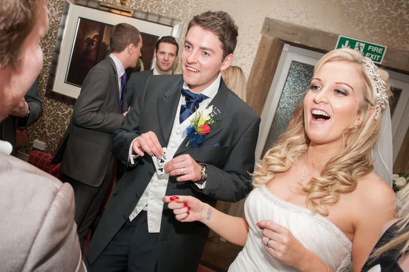 Mark Webb performing close-up magic for wedding guests