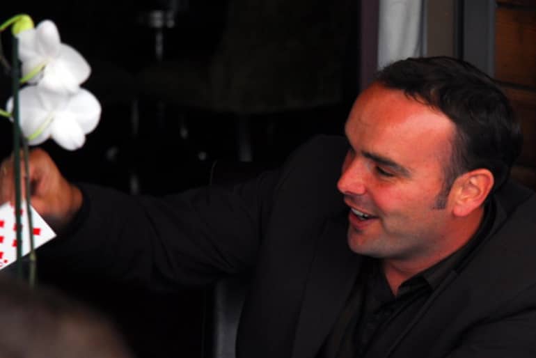 Craig the Magician performing close-up card magic