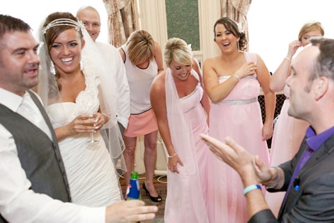 Craig the Magician performing for a wedding party