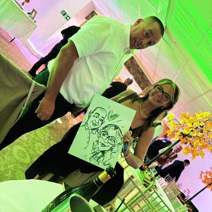 Live caricature of a couple drawn at an event