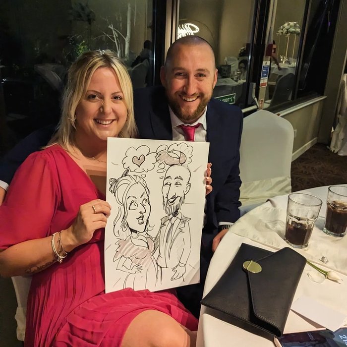 Guest with her live event caricature
