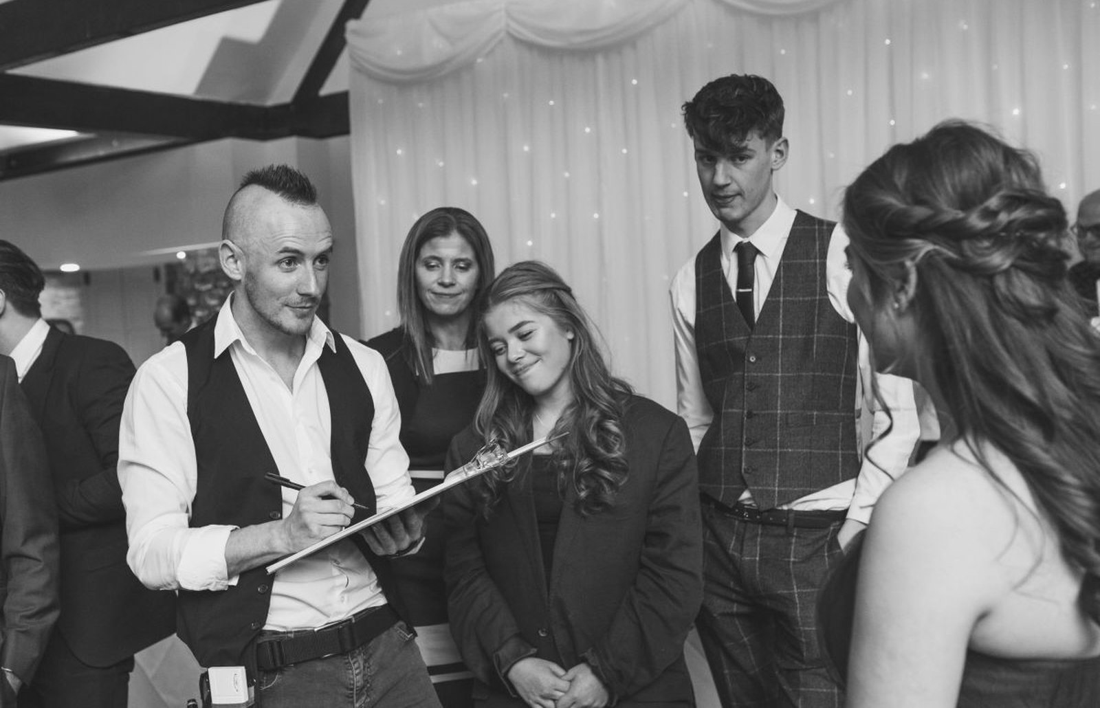 Live caricatures being drawn at a wedding