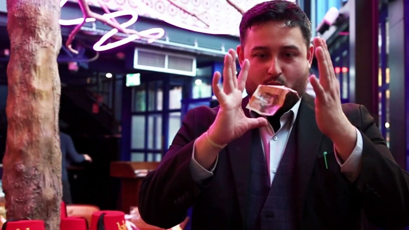 D.S. Magic performing a card flourish for guests