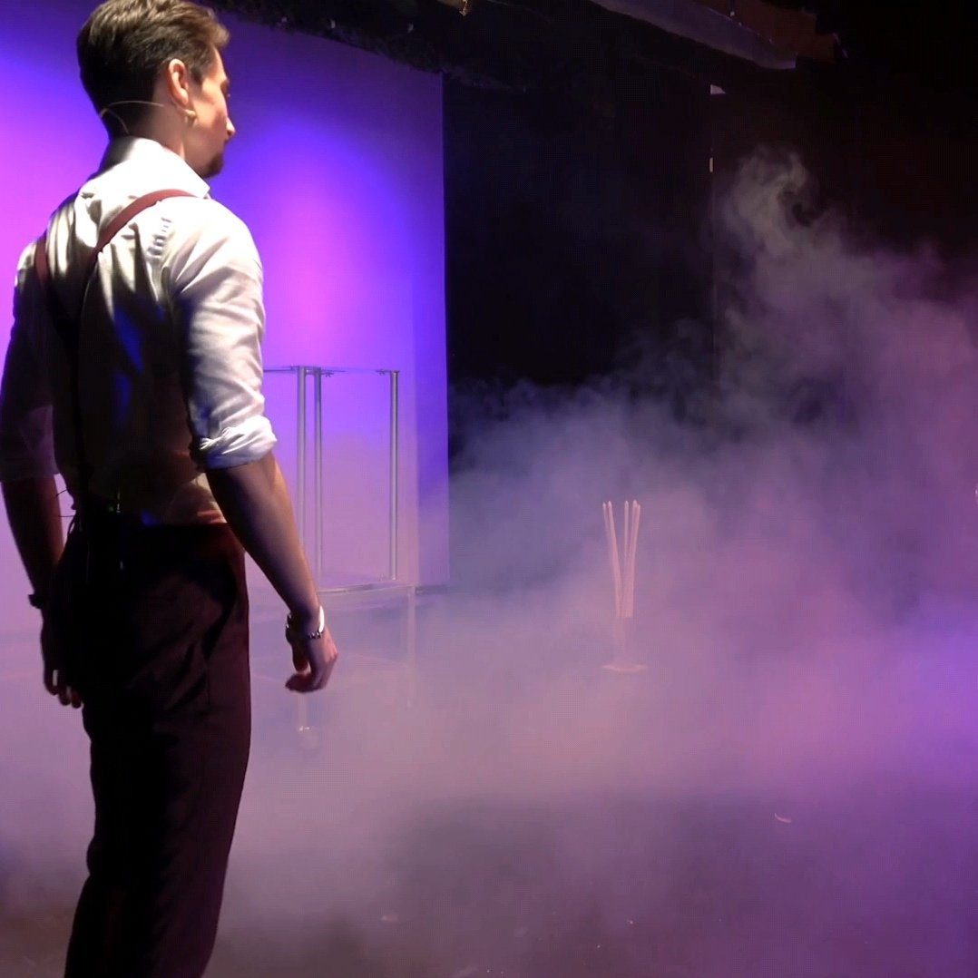 A deck of playing cards mid-routine during a close-up performance