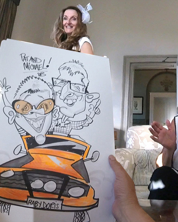 Guest laughing at her caricature with a classic car