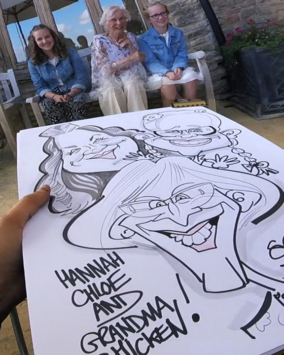 Three generations drawn together on one caricature