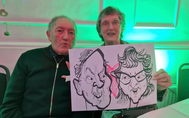 Caledonian Caricatures - couple with their live caricature