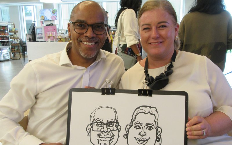 Charming Caricatures - couple with their live double caricature