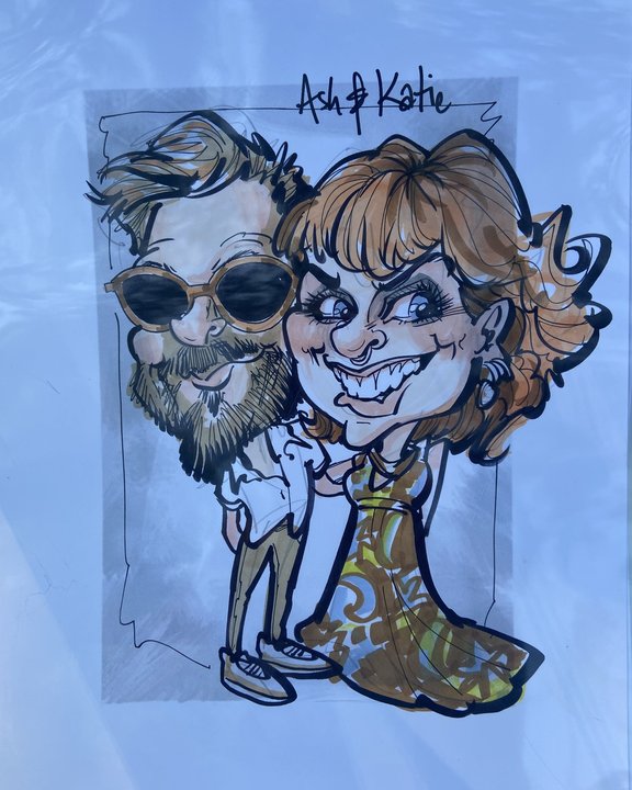 Colour caricature of a bride and groom in sunglasses, drawn at their wedding