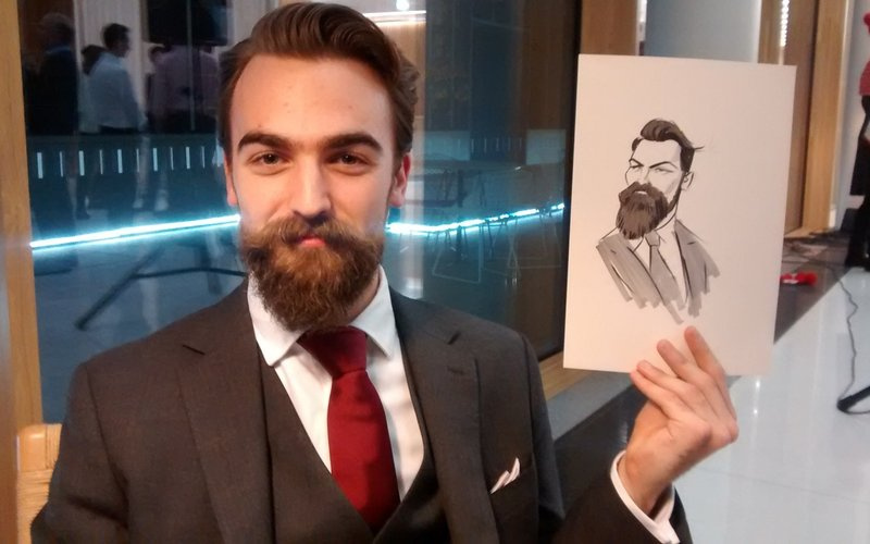 Headline Caricatures - guest with his live caricature