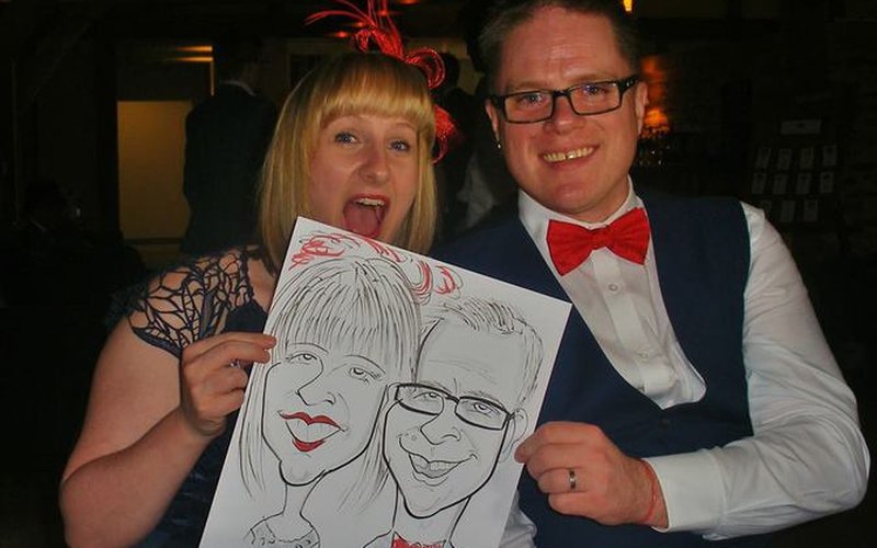 Heartland Caricatures - wedding guests with their live caricature