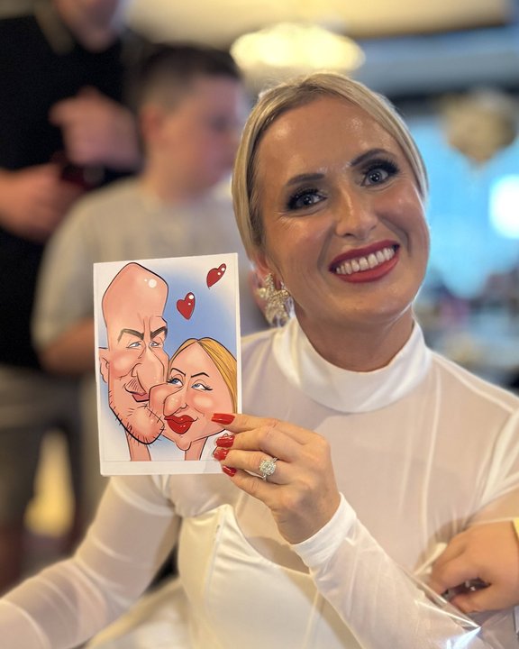 Bride holding a colour digital caricature print