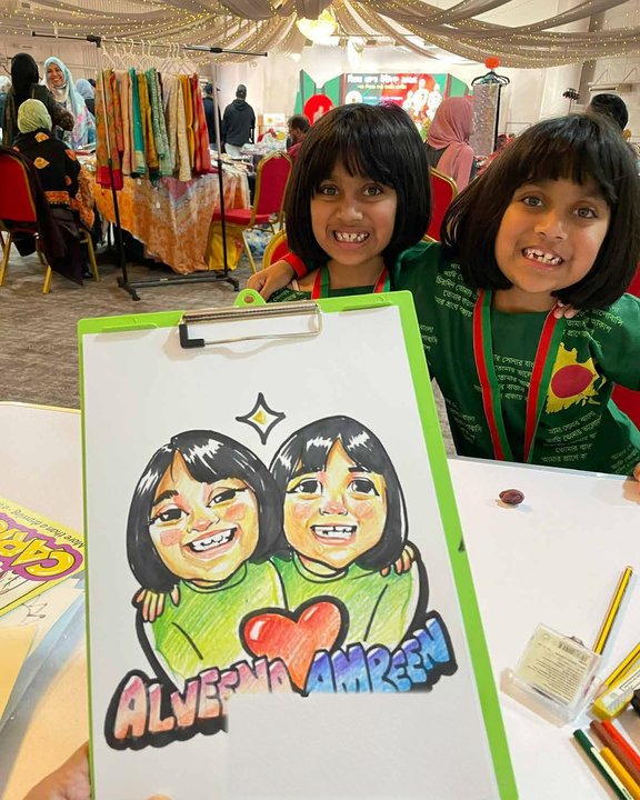 Two sisters with their colour double caricature at a family festival